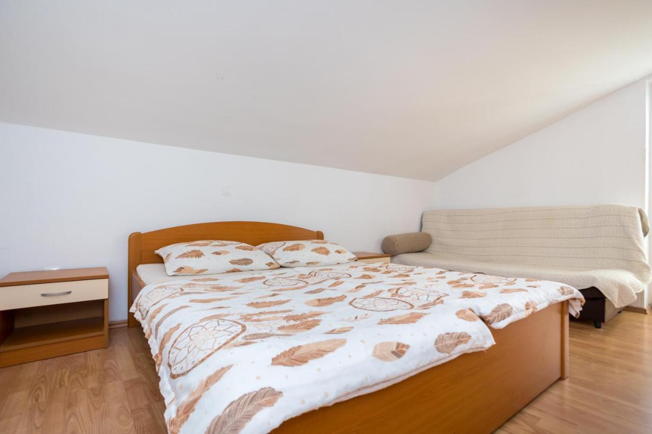 Apartmani Sandra Malinska Sveti Vid-Miholjice Bagian luar foto